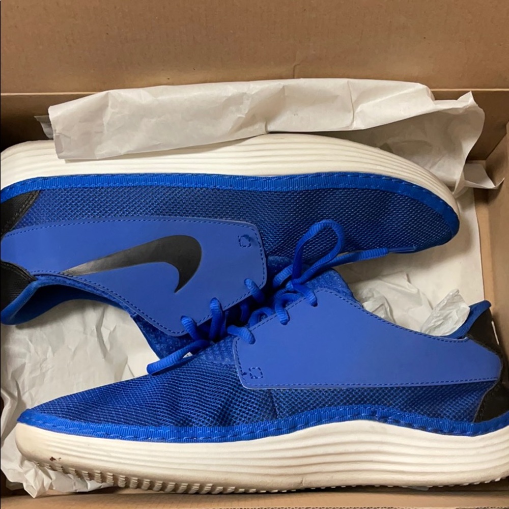 Almost NEW blue NIKE SolarSoft Moccasins